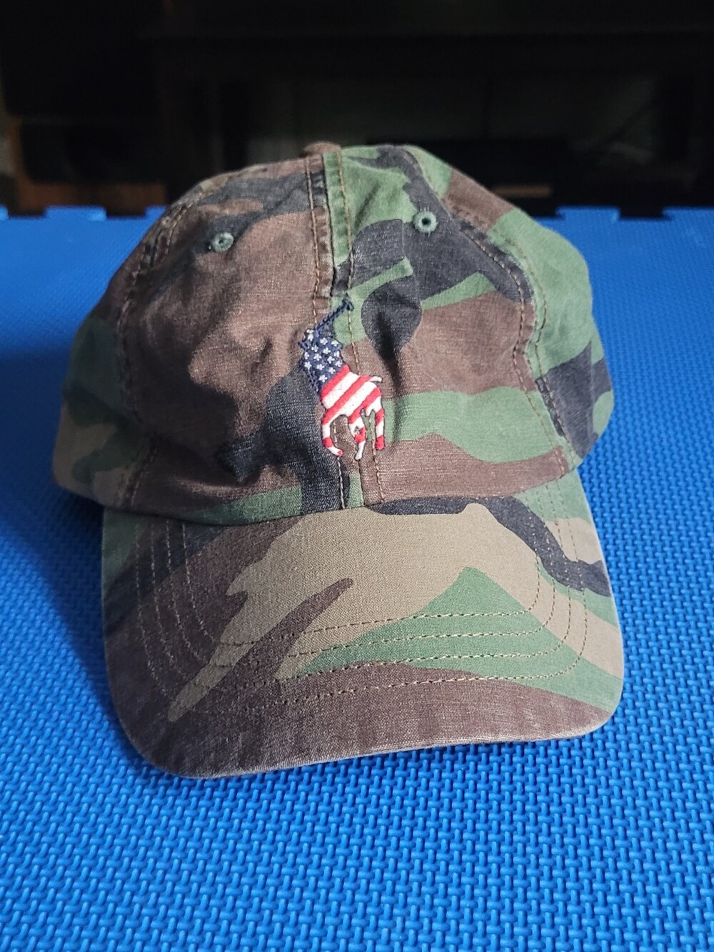 Polo Ralph Lauren camouflage baseball cap featuring an embroidered American flag